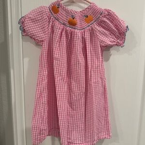 Smocked pumpkin size 7 kids dress. Brand new without tags